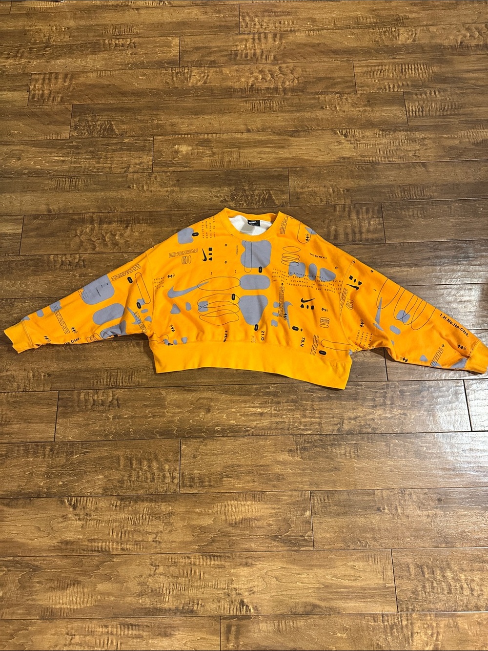 Nike Bright Orange Graphic Cropped Crewneck Sweatshirt